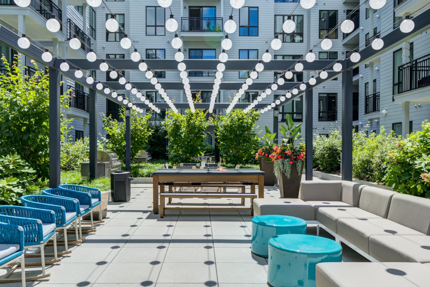 Enjoy a cozy evening under the twinkle lights at our rooftop lounge.
