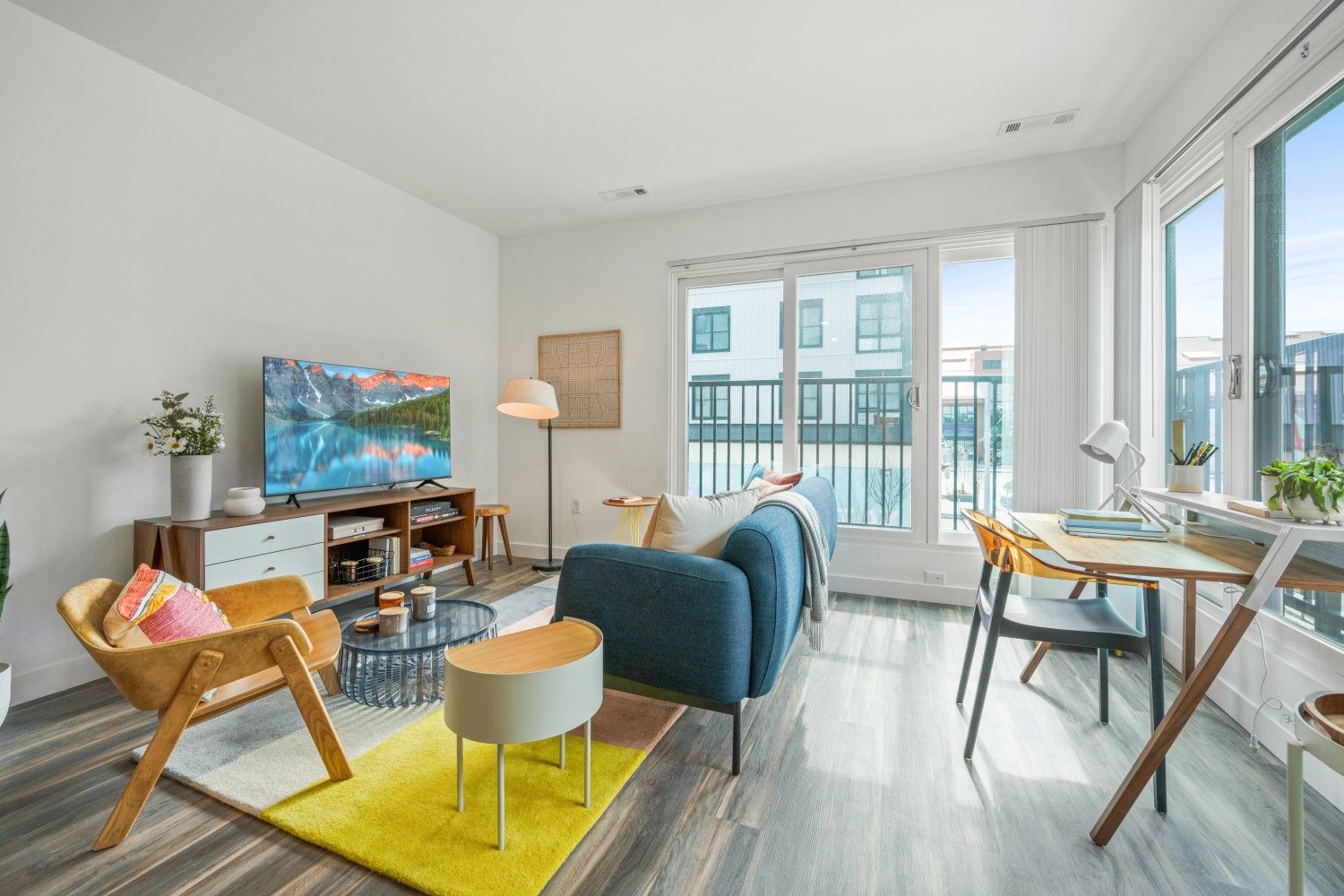 Full length windows and Juliet balconies allow endless natural light into Blvd & Bond apartment homes.