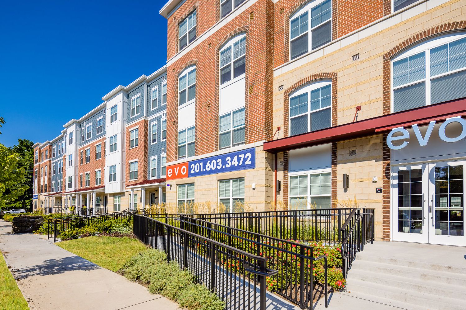 Exterior view of building entrance and sidewalk