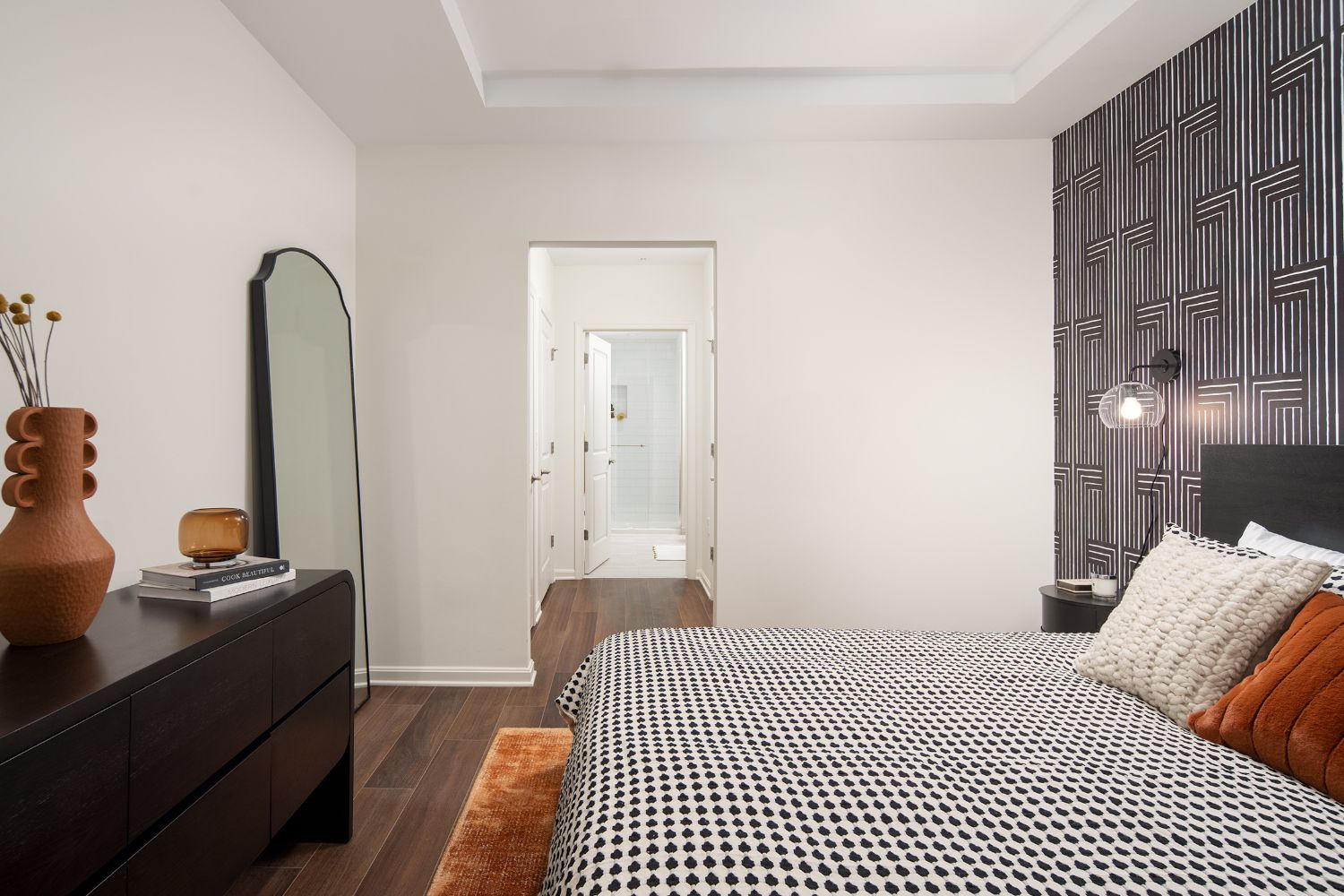Bedrooms at The Claude offer comfortable living