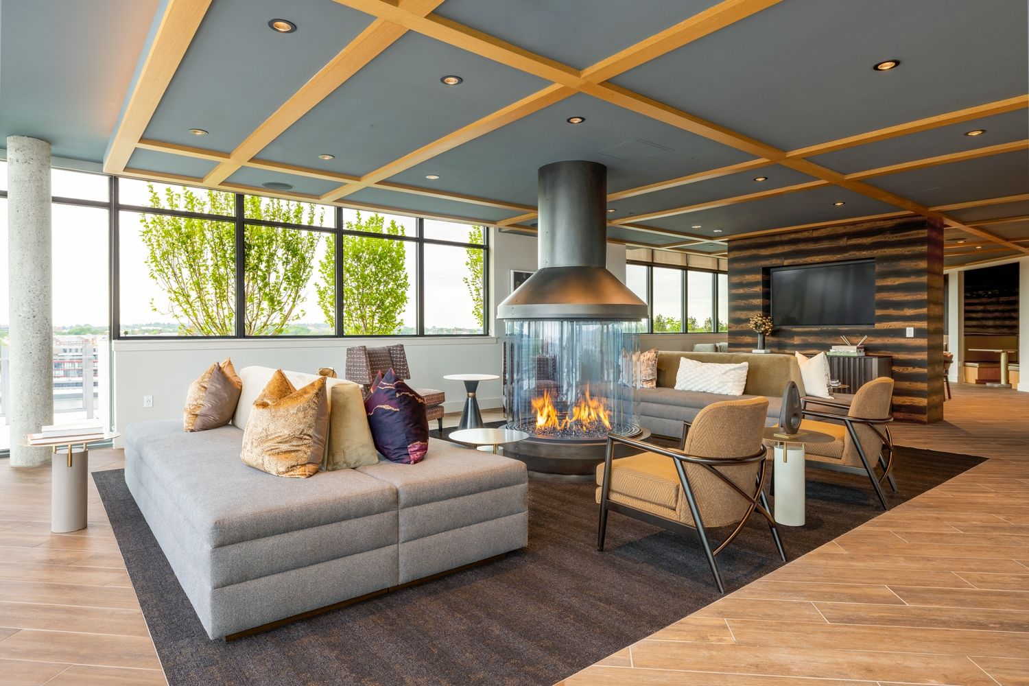 Sophisticated roofttop clubhouse featuring a large fireside lounge