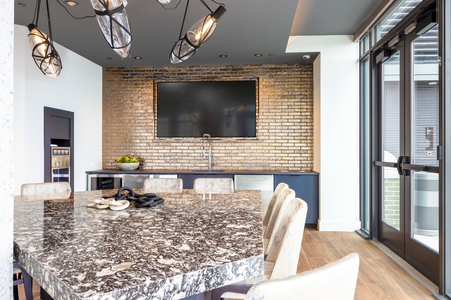 Unwind at the luxury rooftop wet bar featuring a wine dispensing station