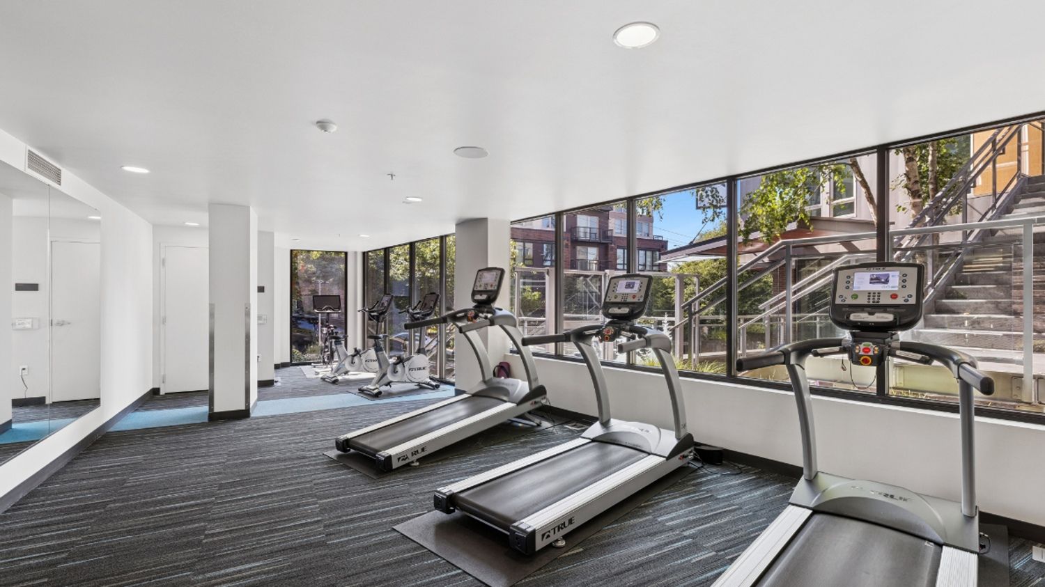Apartment gym at Eleanor in Seattle with cycling equipment