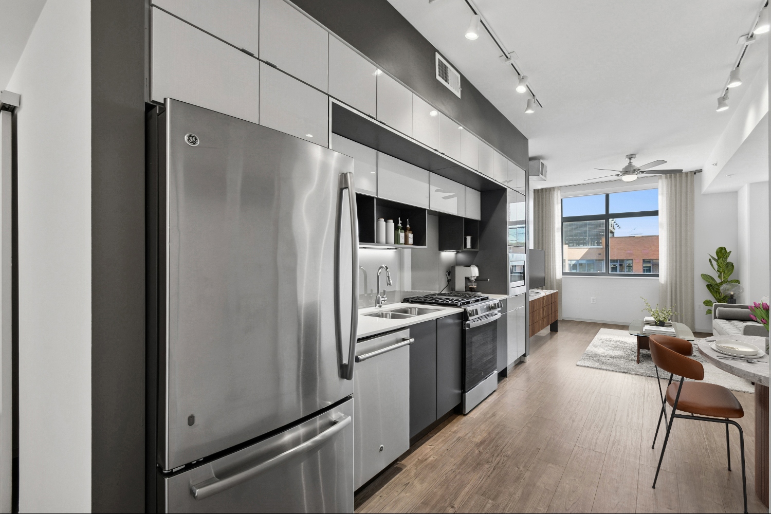Entryway to home with kitchen on left