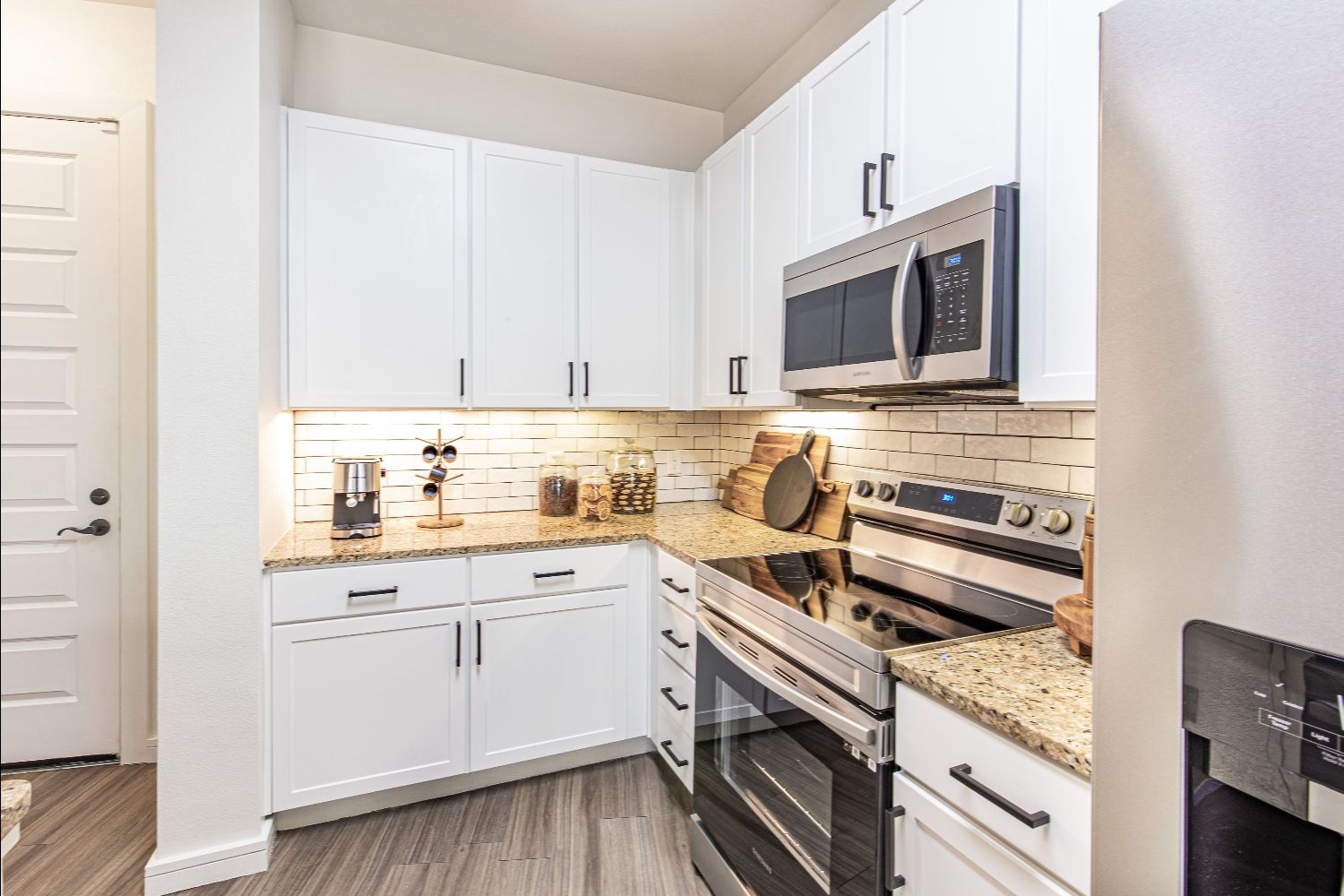 Apartment kitchen with stainless steel appliances