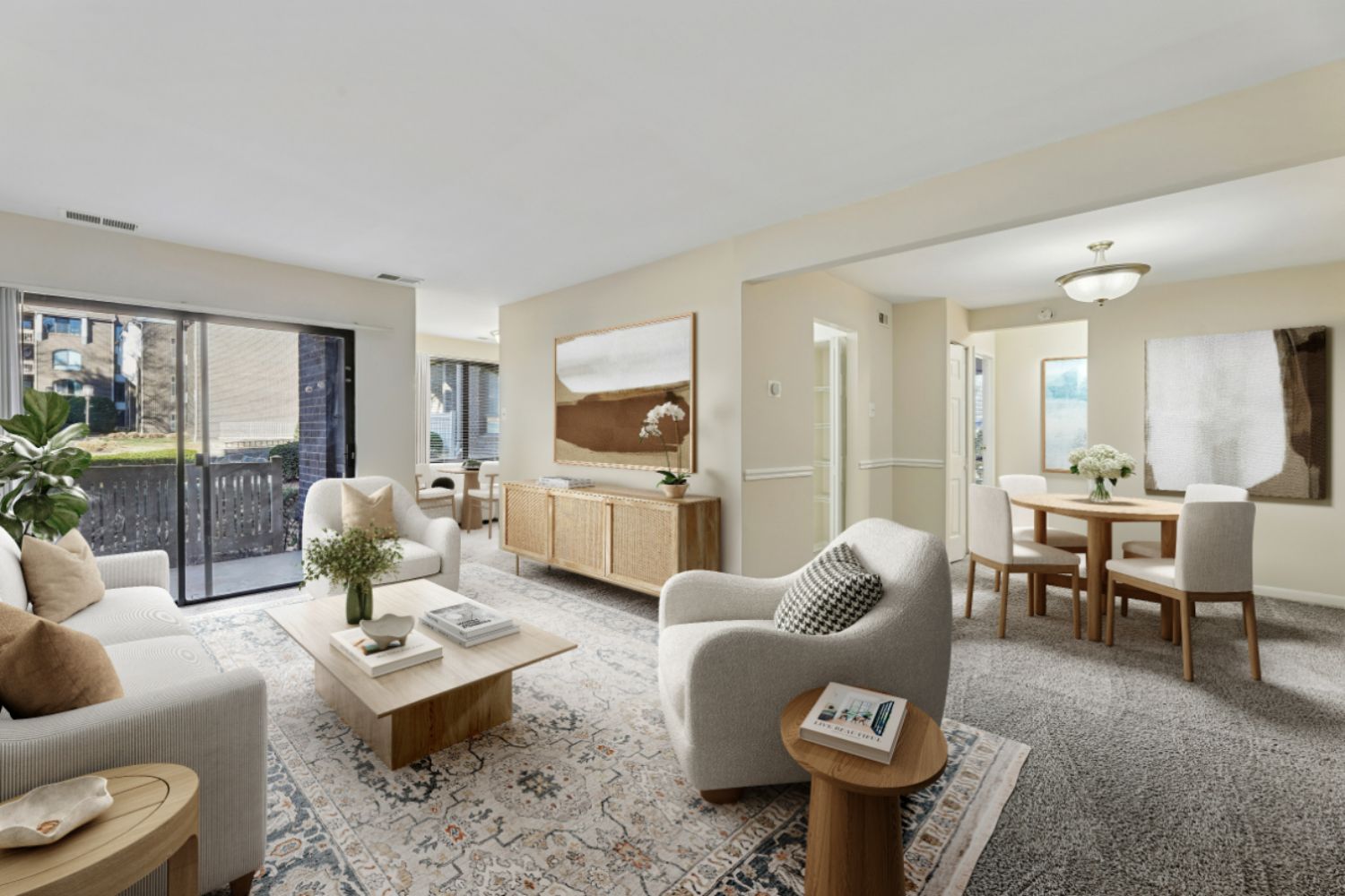 Apartment living room with couches and dining room table