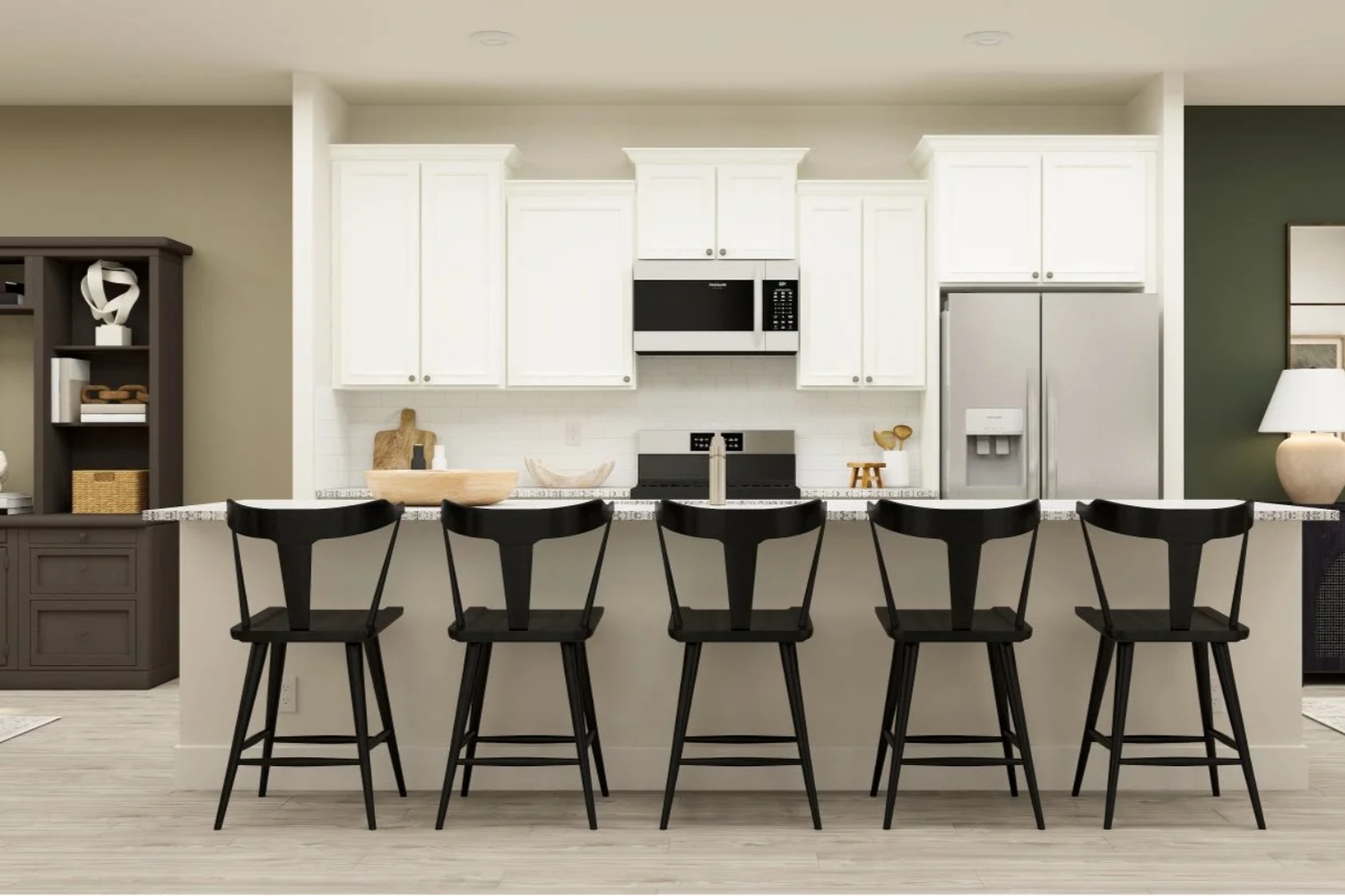 Modern kitchen with white cabinets, stainless steel appliances, and black bar stools.