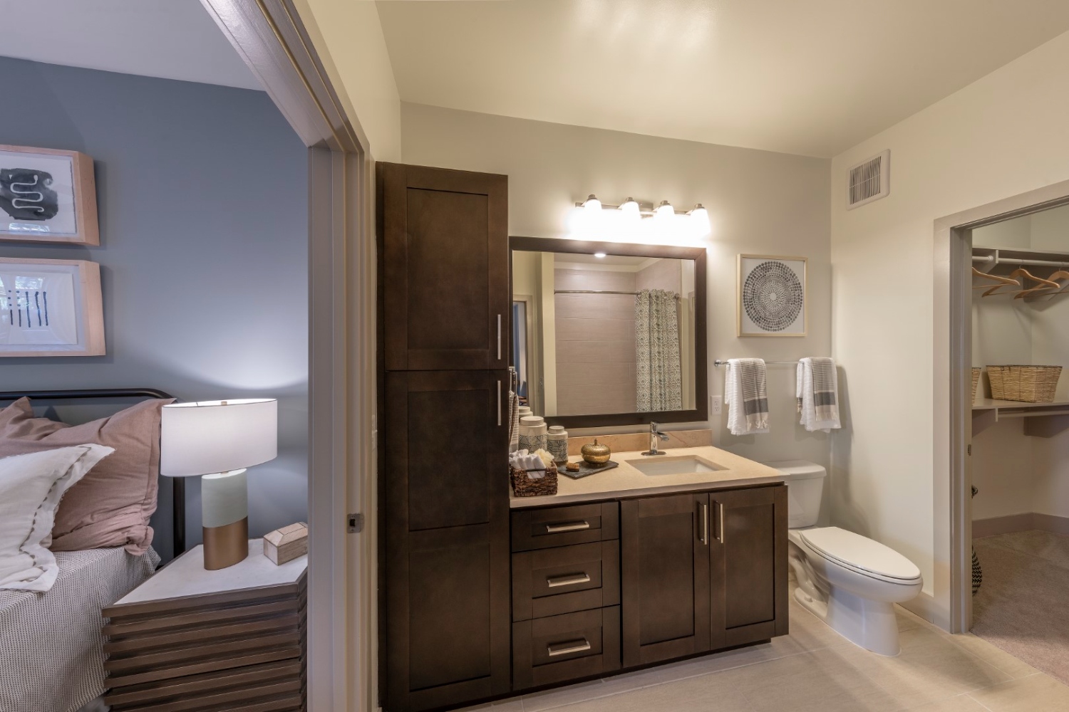 Bathroom interior featuring a sink, mirror, and contemporary finishes.