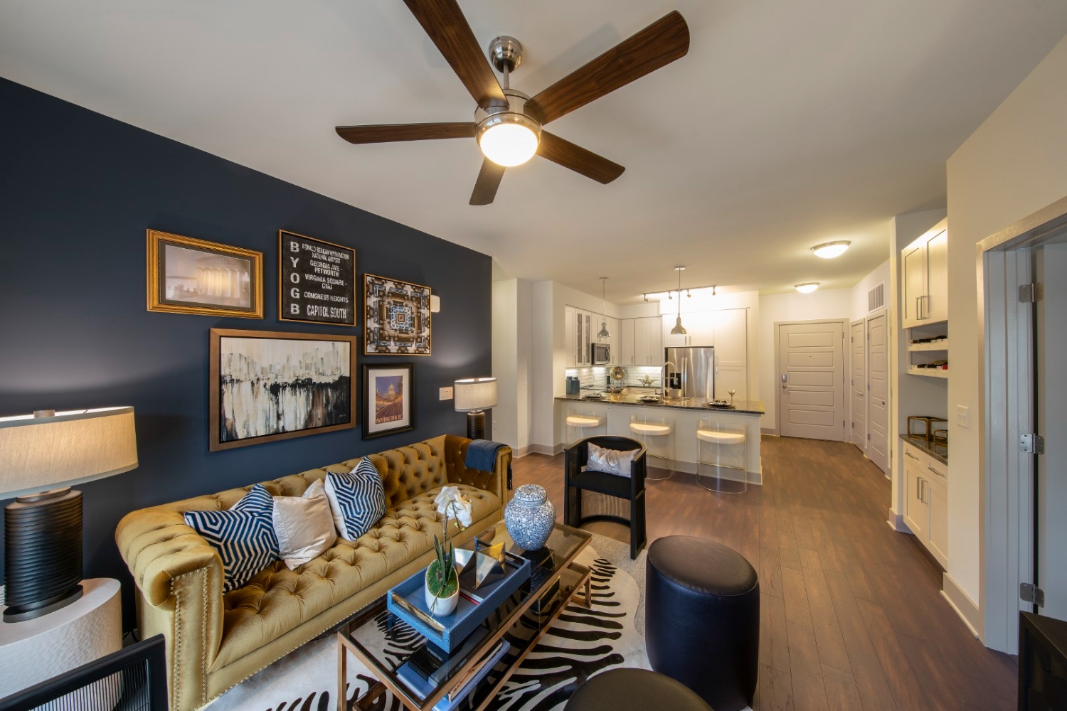 Bright apartment living room with open layout and natural light.