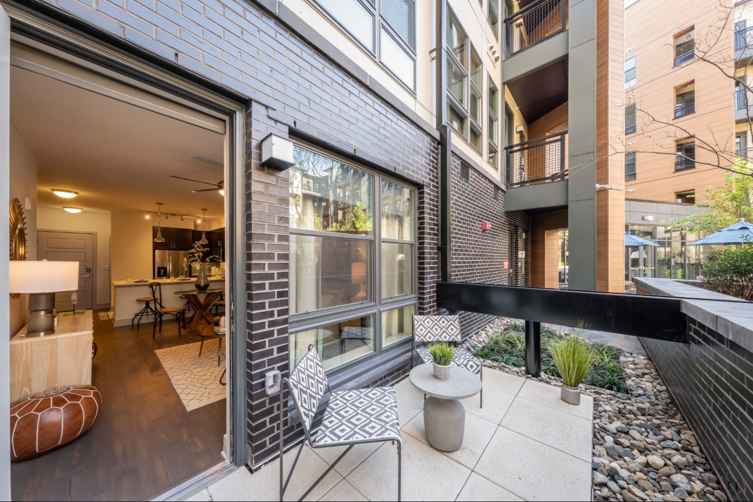 Apartment patio designed for outdoor relaxation.
