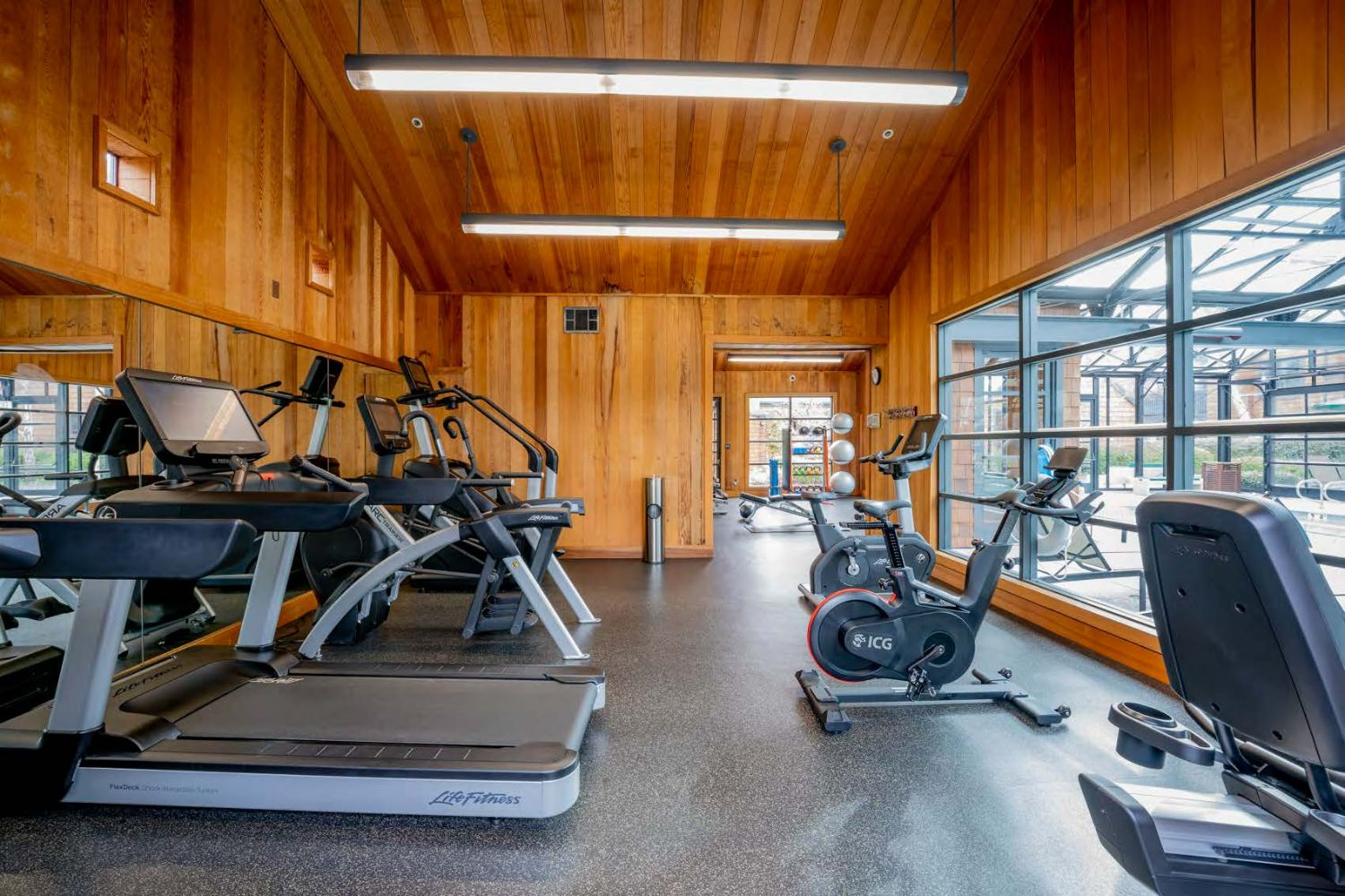 Apartment fitness center with weights and cardio machines