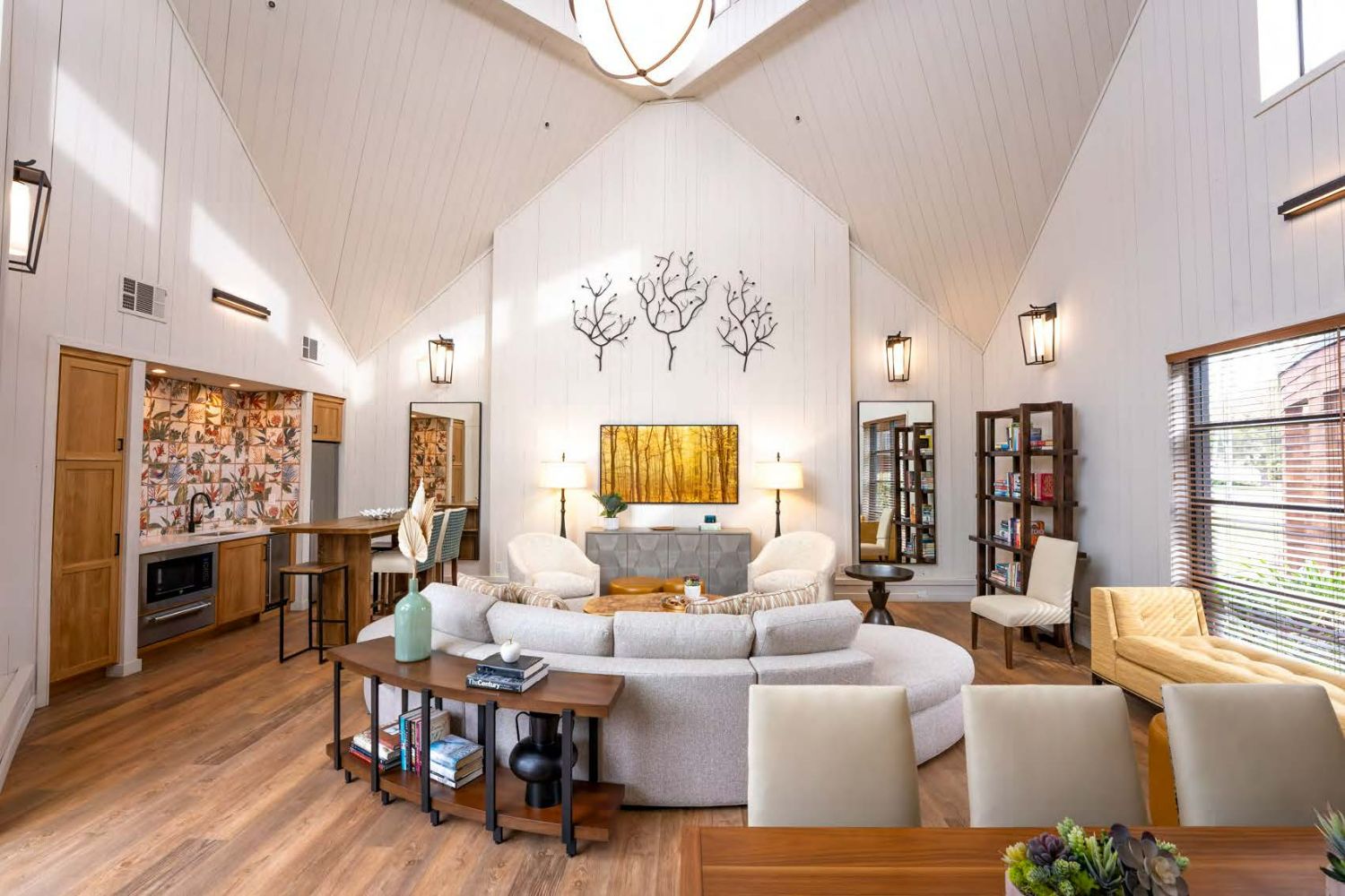 Luxury apartment resident clubroom with modern seating and communal spaces