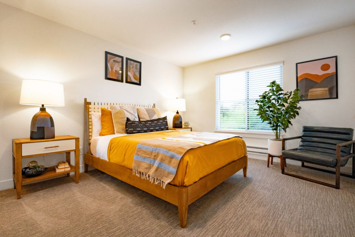 Apartment bedroom designed for relaxation with natural light and modern accents