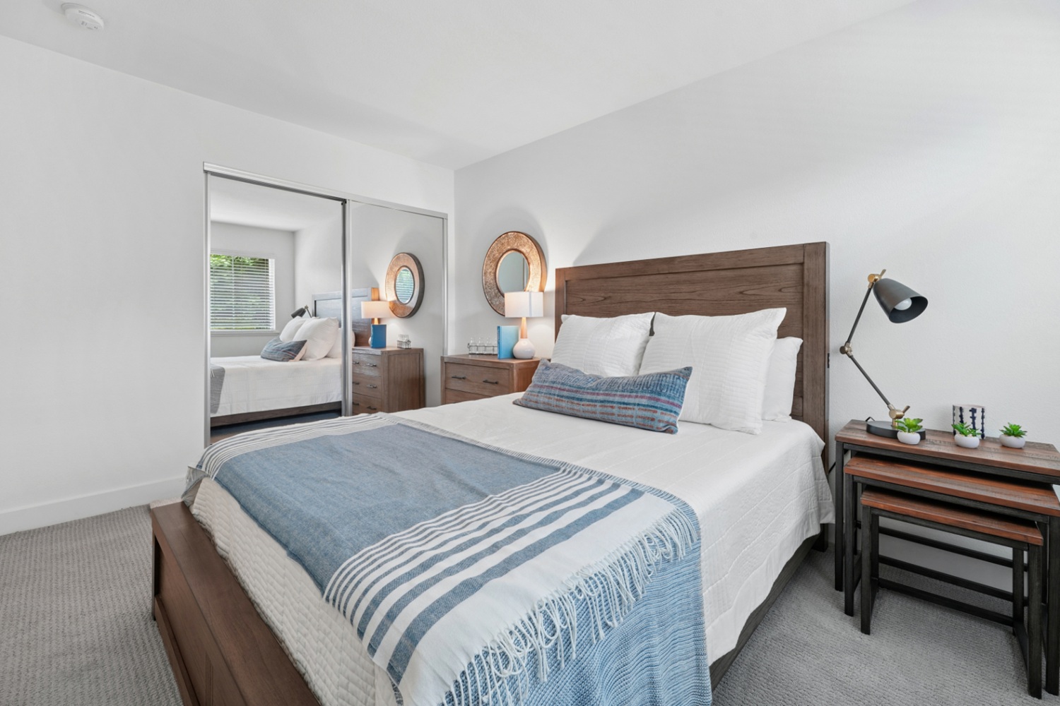 Bedroom with ample space and natural light at Old Orchard Apartments