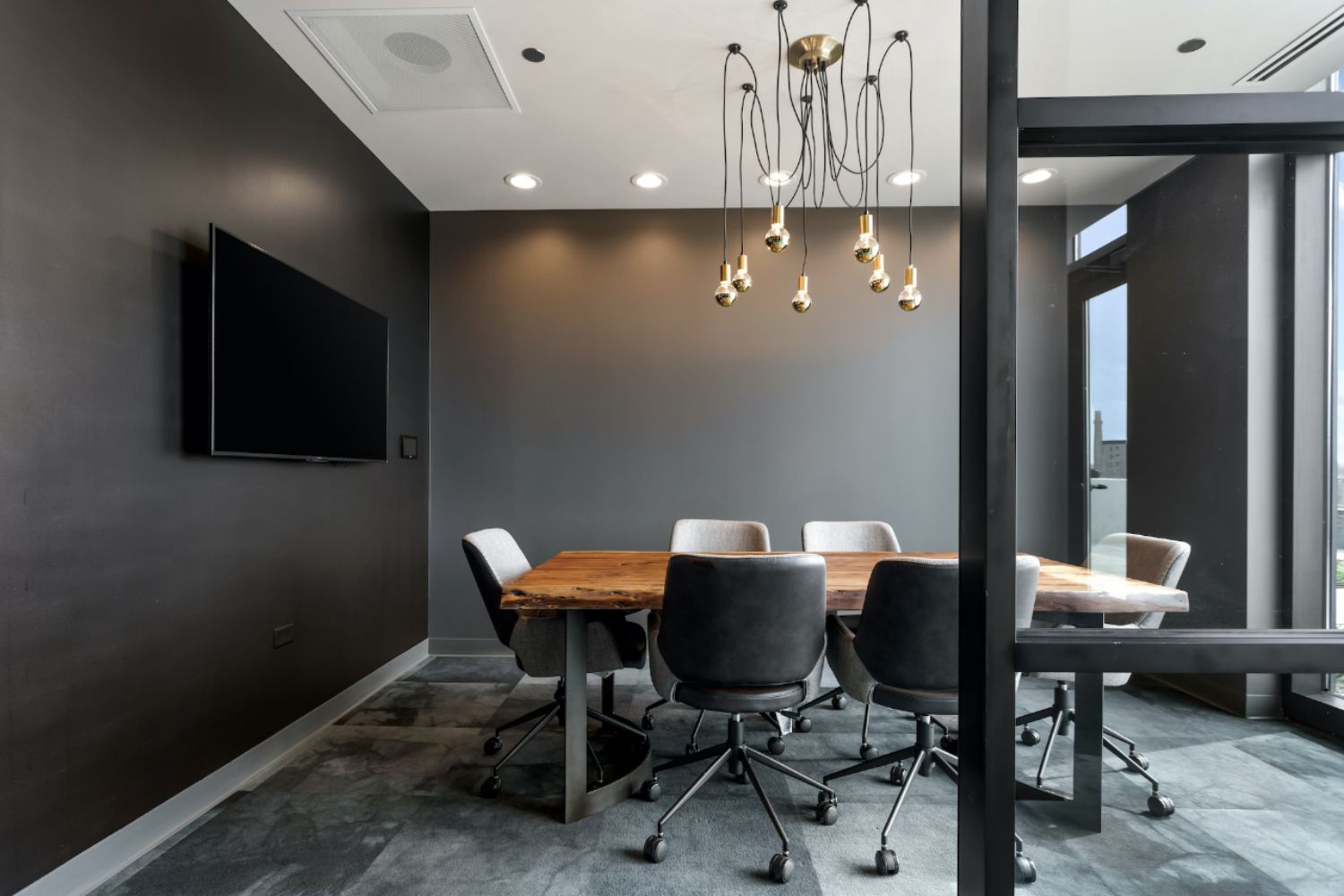 Co-working lounge at Logan Apartments in Logan Square Chicago with comfortable workspace and natural light