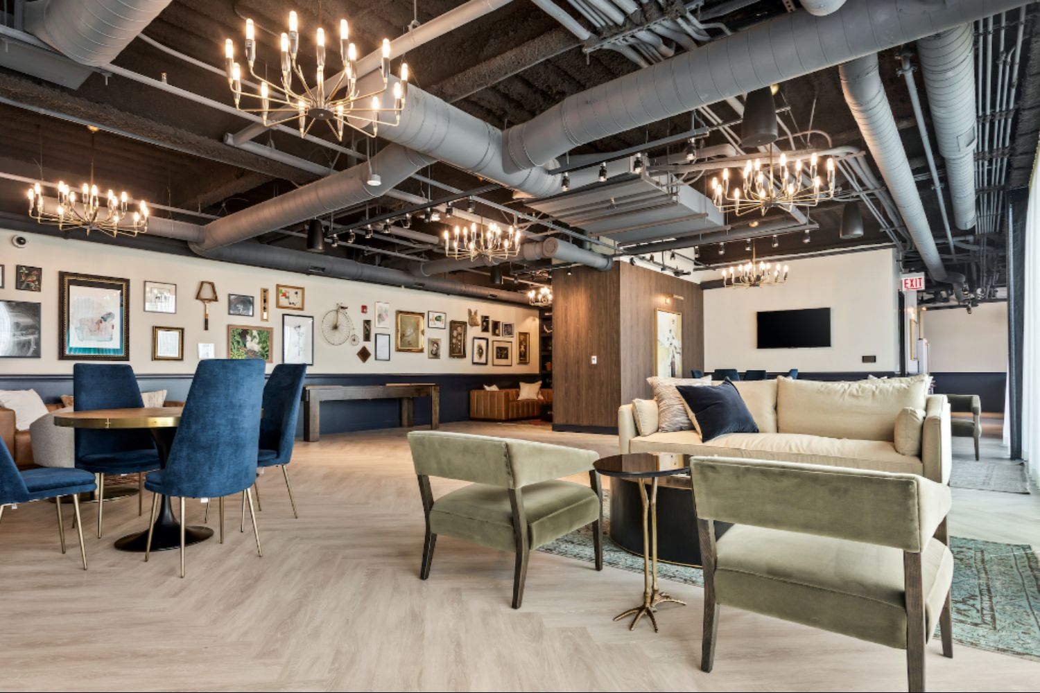 Resident clubroom at Logan Apartments in Logan Square Chicago with upscale lounge seating and modern design