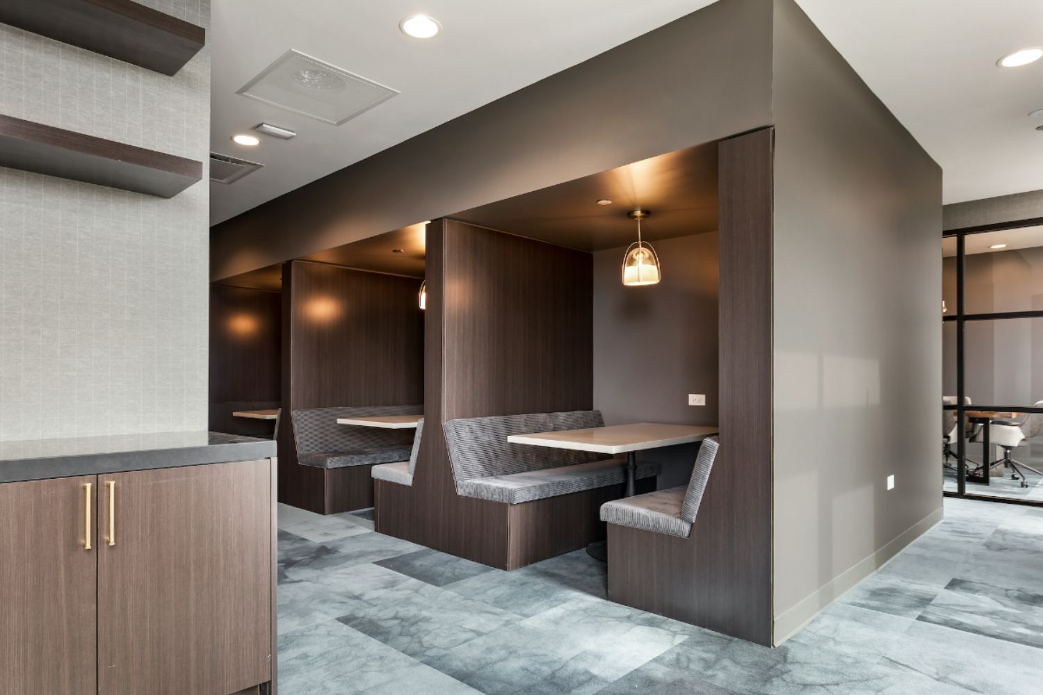 Co-working lounge at Logan Apartments in Logan Square Chicago with comfortable workspace and natural light