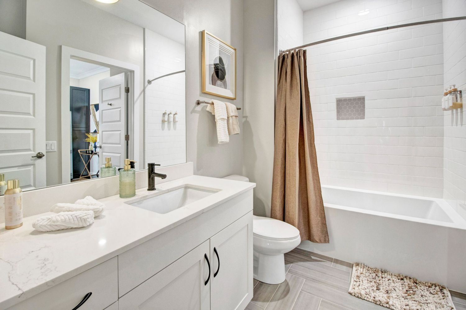 Modern bathroom in Crossroads at the Gulch Apartments.