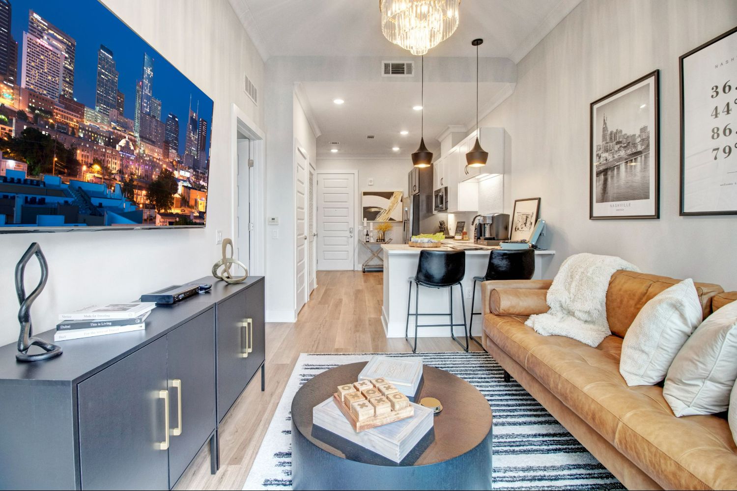 Modern living room in Crossroads at the Gulch Apartments.