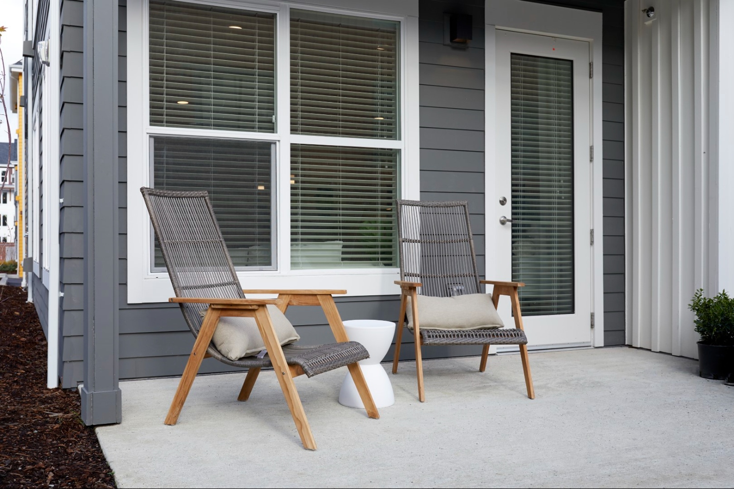 Apartment patio with outdoor seats at Anthology apartments