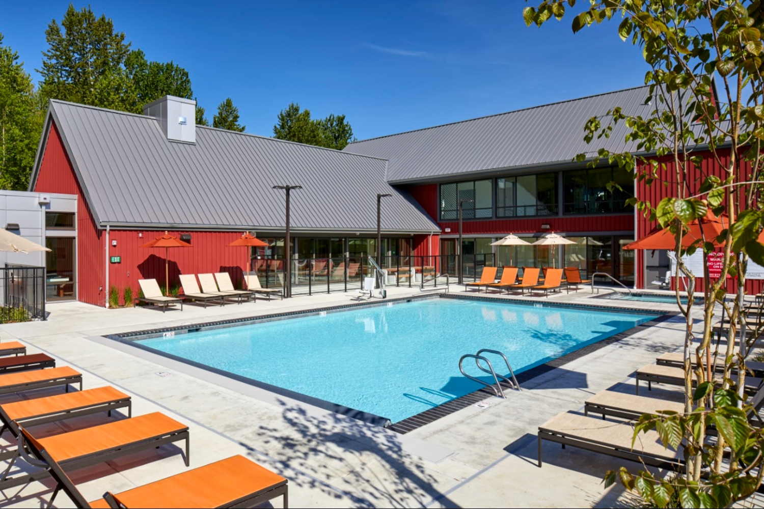 Pool area with lounge chairs