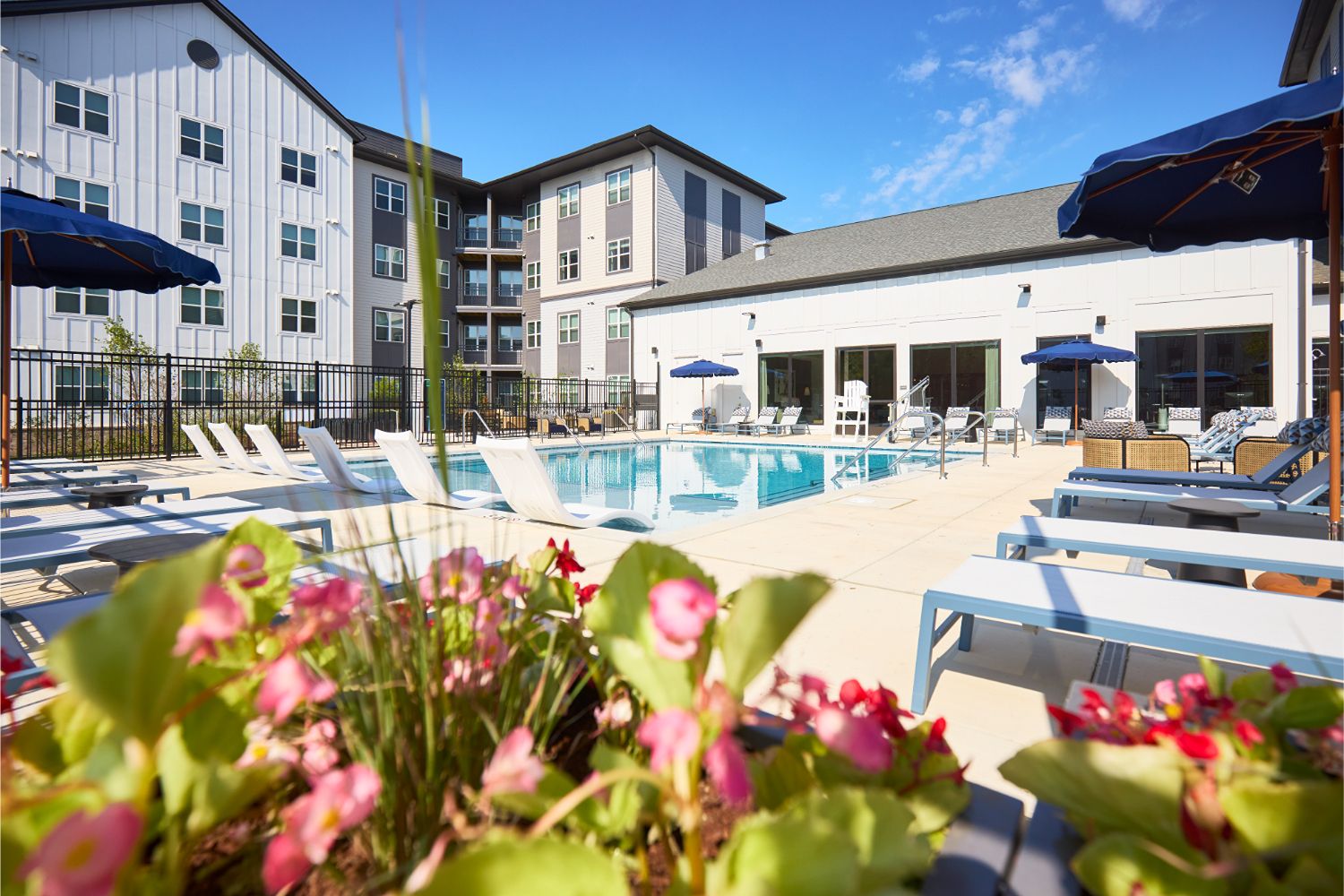Poolside seating area at Alexan Brandywine luxury apartments in Brandywine, MD.