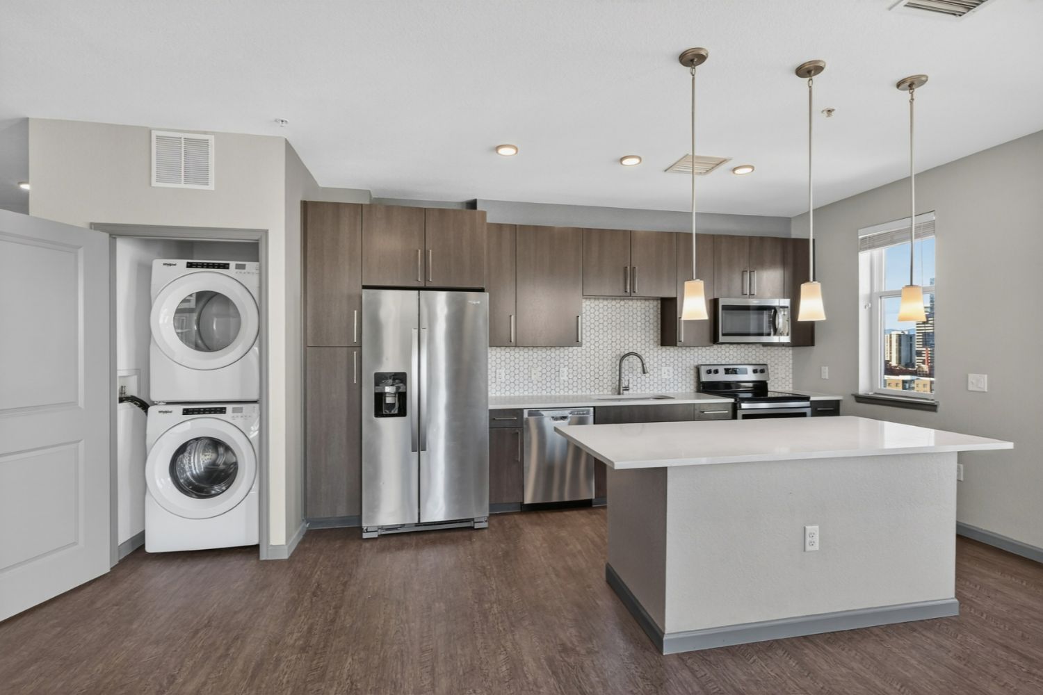 Luxury kitchen with wood cabinets and stainless steel appliances