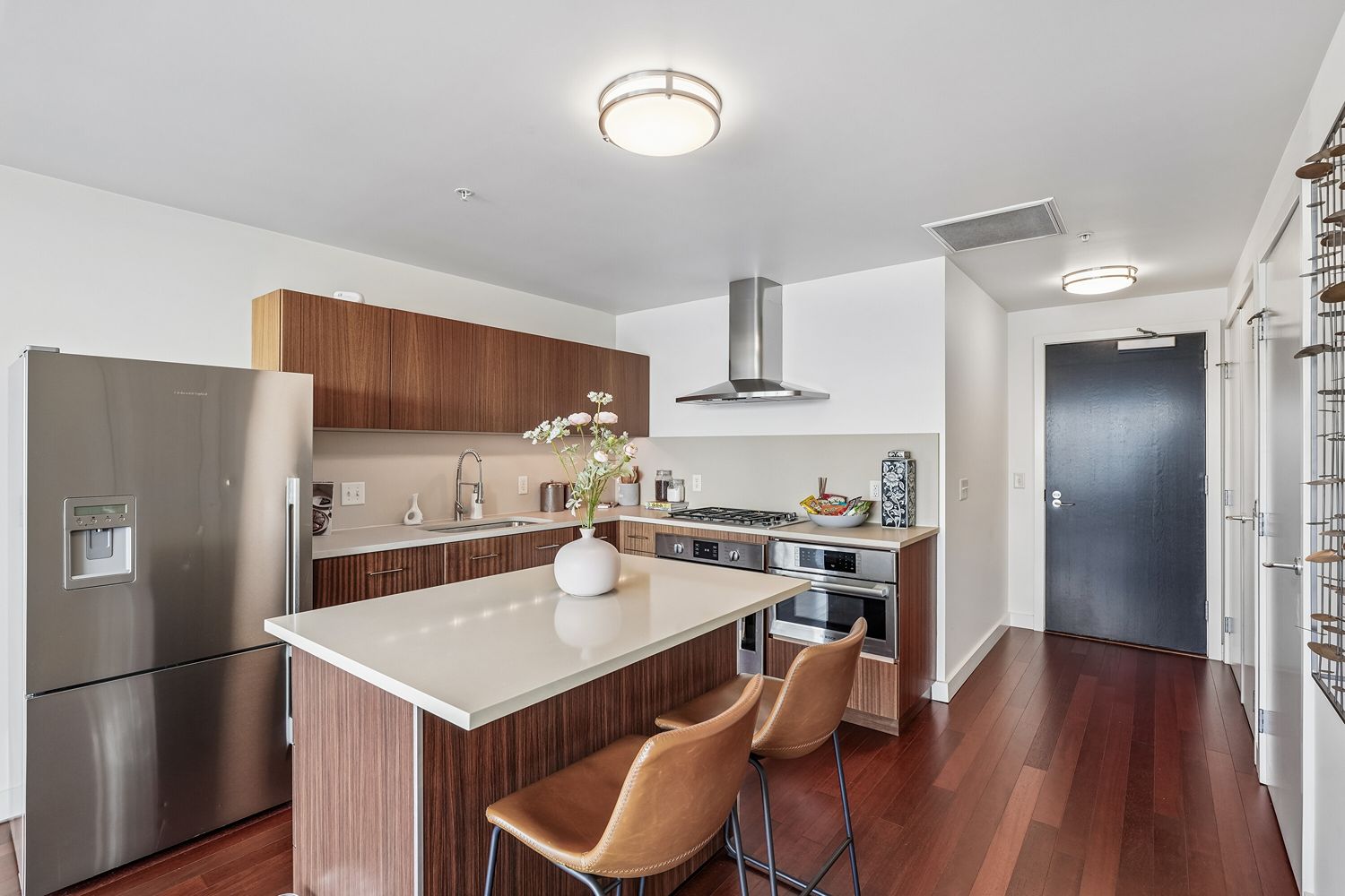 Kitchen featuring a large island and contemporary finishes